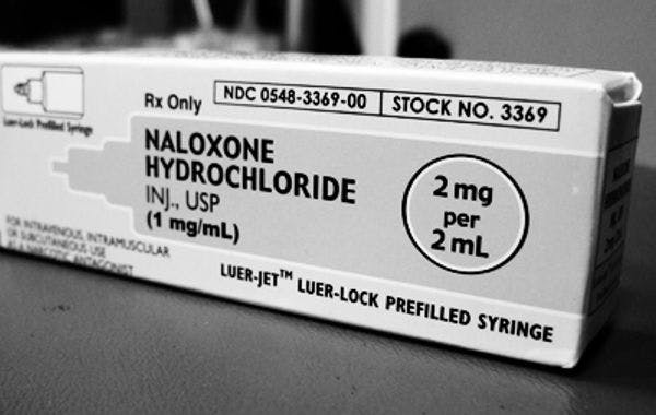 Opioid overdose rates and implementation of overdose education and nasal naloxone distribution in Massachusetts: interrupted time series analysis